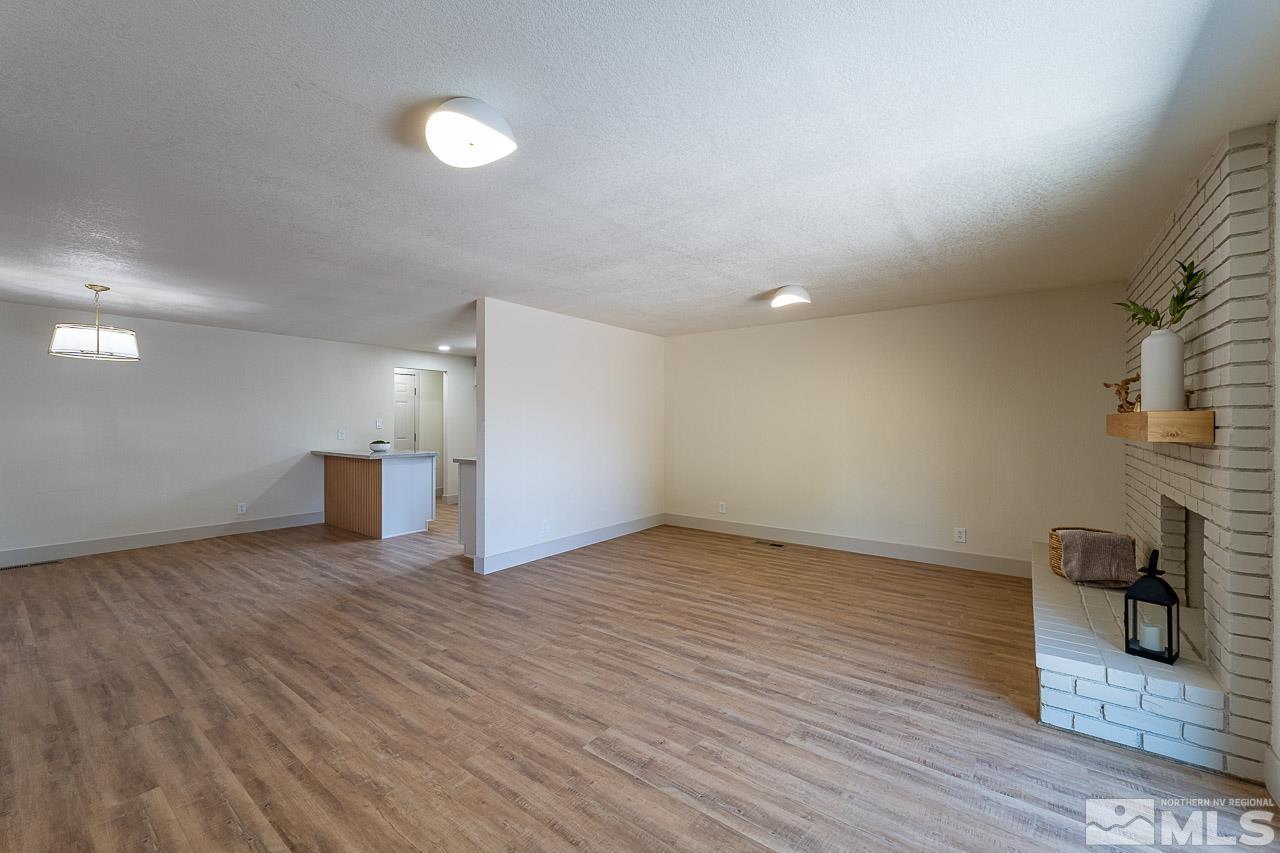 2857 Jake Street Reno, NV 89502 - Photo 11 of 22 a view of empty room with wooden floor