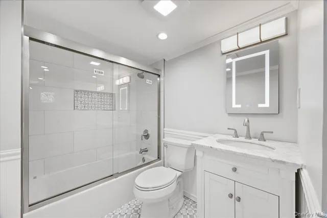 a view of room with wooden floor