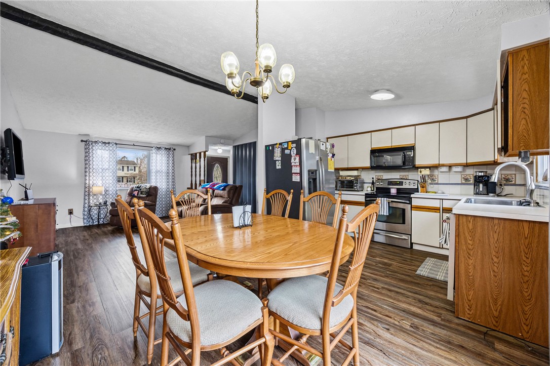 842 Independence Drive Webster, NY 14580 - Photo 7 of 29 Living/Kitchen/Dining View