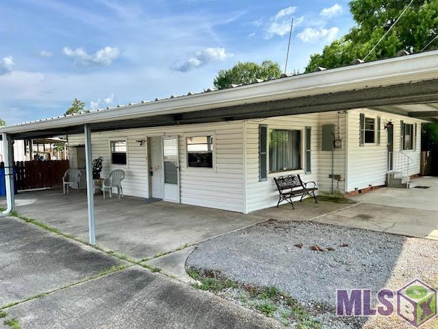 119 Lydia Street Patterson, LA 70392 - Photo 17 of 25 backyard carport