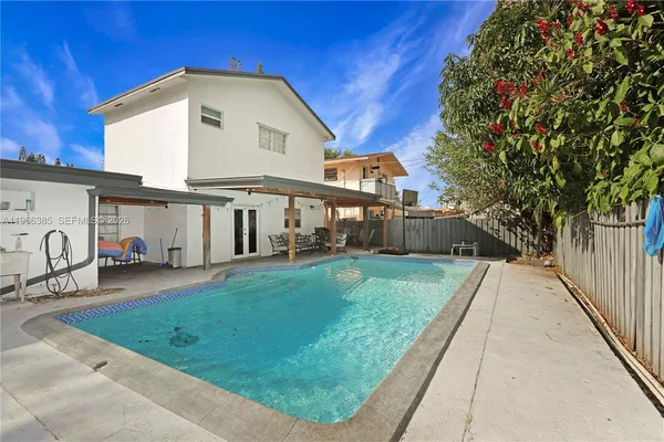 a view of backyard of house