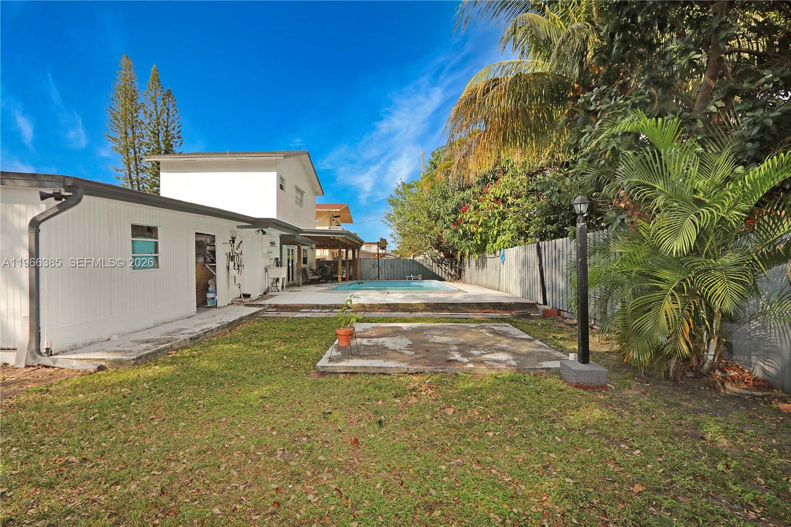 1221 Southwest 74th Court Miami, FL 33144 - Photo 30 of 42 a view of backyard of house