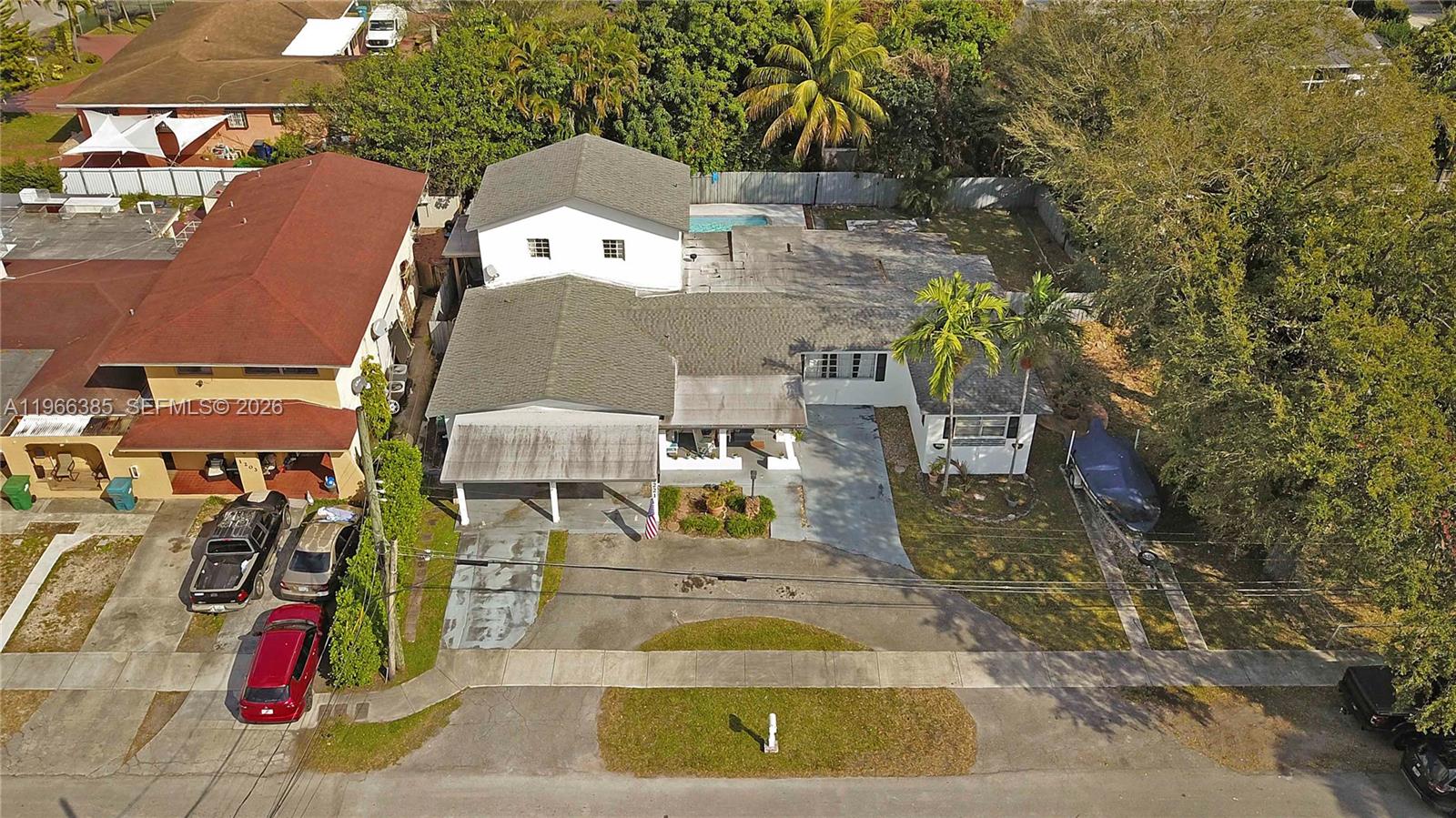 1221 Southwest 74th Court Miami, FL 33144 - Photo 40 of 42 an aerial view of residential houses with outdoor space