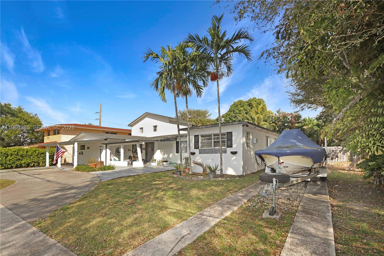 1221 Southwest 74th Court Miami, FL 33144 - Photo 41 of 42 a front view of a house with a ocean view