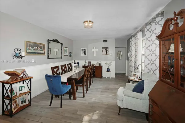 a living room with furniture and a table