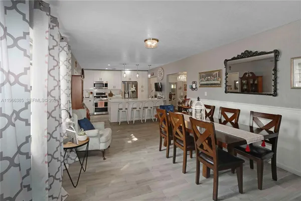 a view of a dining room with furniture