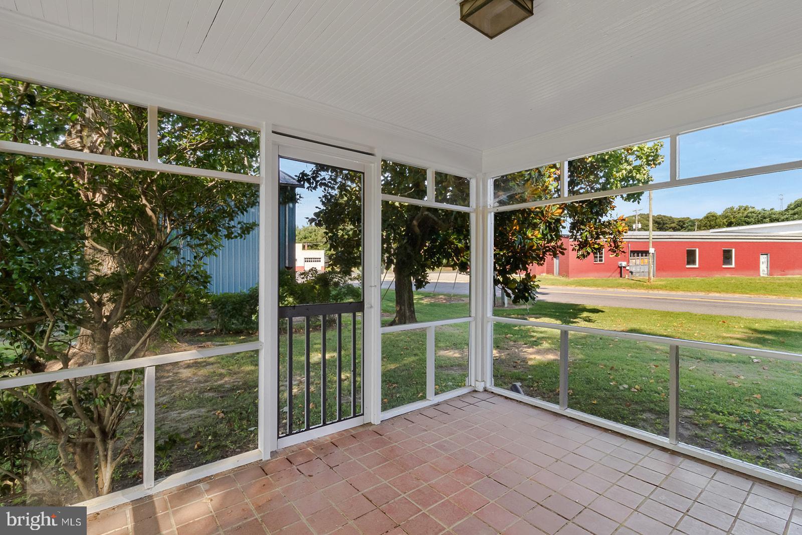 52 Lake Road Lottsburg, VA 22511 - Photo 18 of 42 Shaded screened porch is delightful
