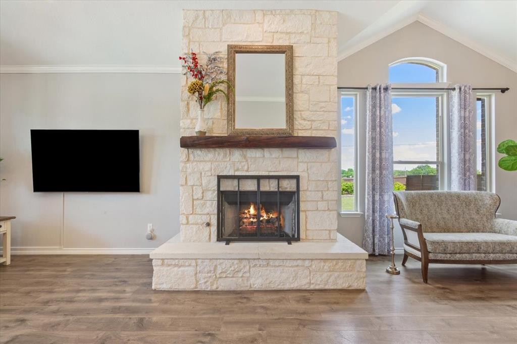 101 Rancho Lorena Drive Lorena, TX 76655 - Photo 12 of 40 a living room with furniture and a fireplace
