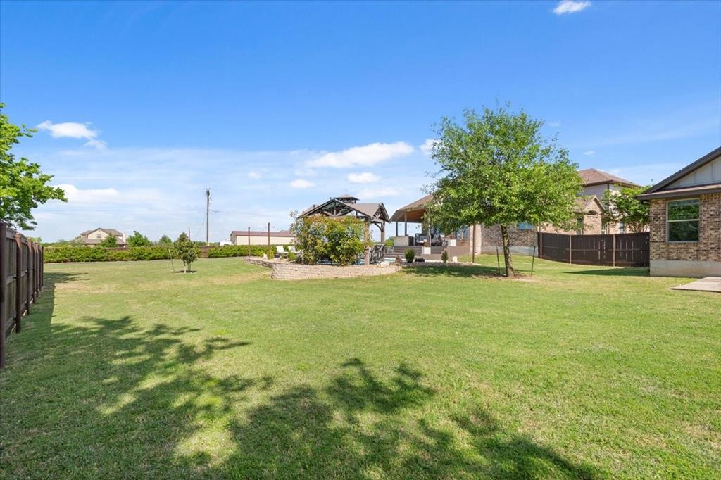 101 Rancho Lorena Drive Lorena, TX 76655 - Photo 39 of 40 a view of a water fountain and a big yard