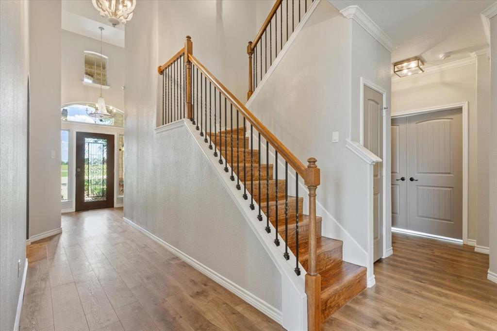 101 Rancho Lorena Drive Lorena, TX 76655 - Photo 6 of 40 a view of entryway and hall with wooden floor