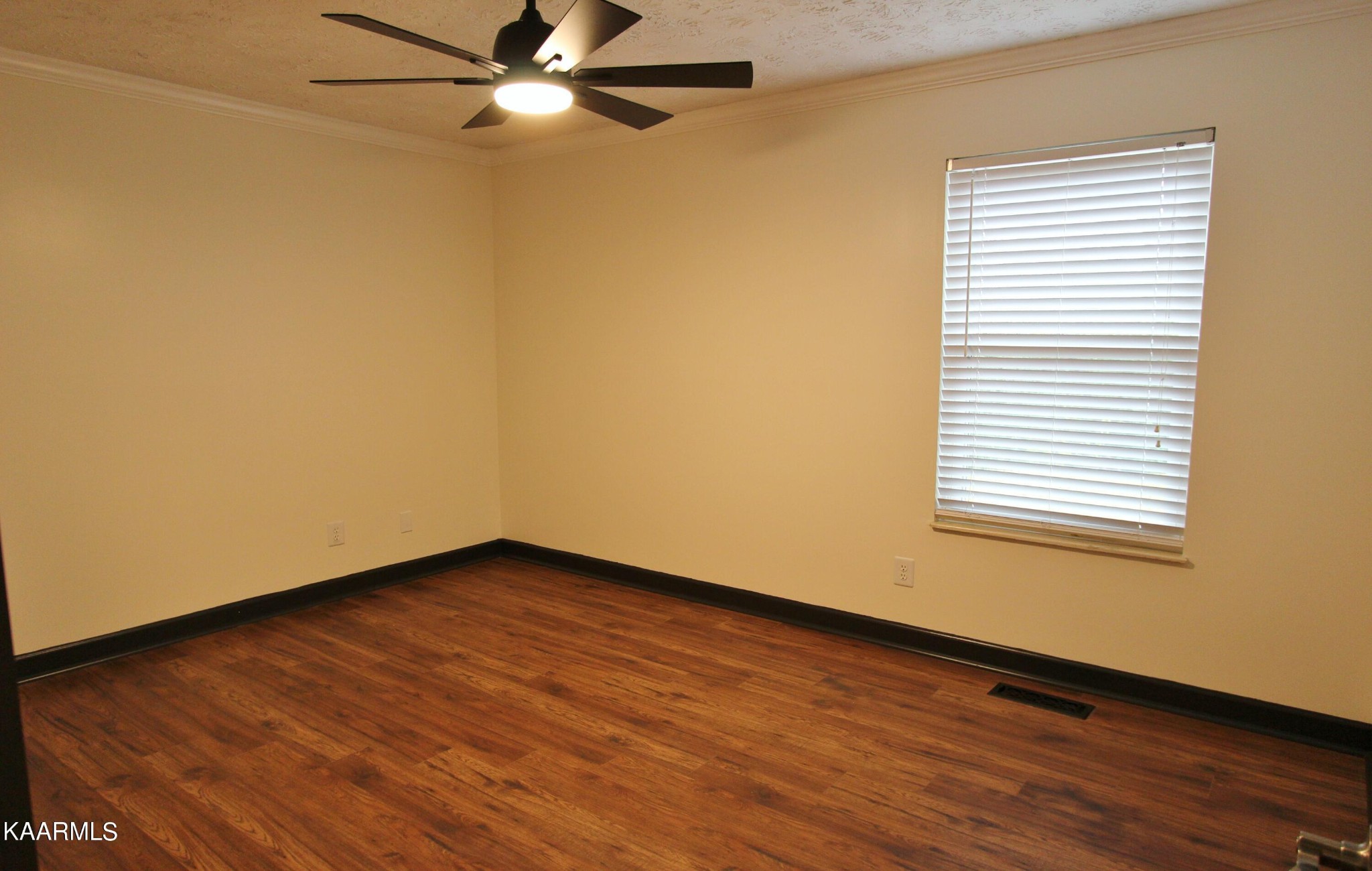4222 Abercorn Road Knoxville, TN 37921 - Photo 14 of 33 an empty room with wooden floor and windows