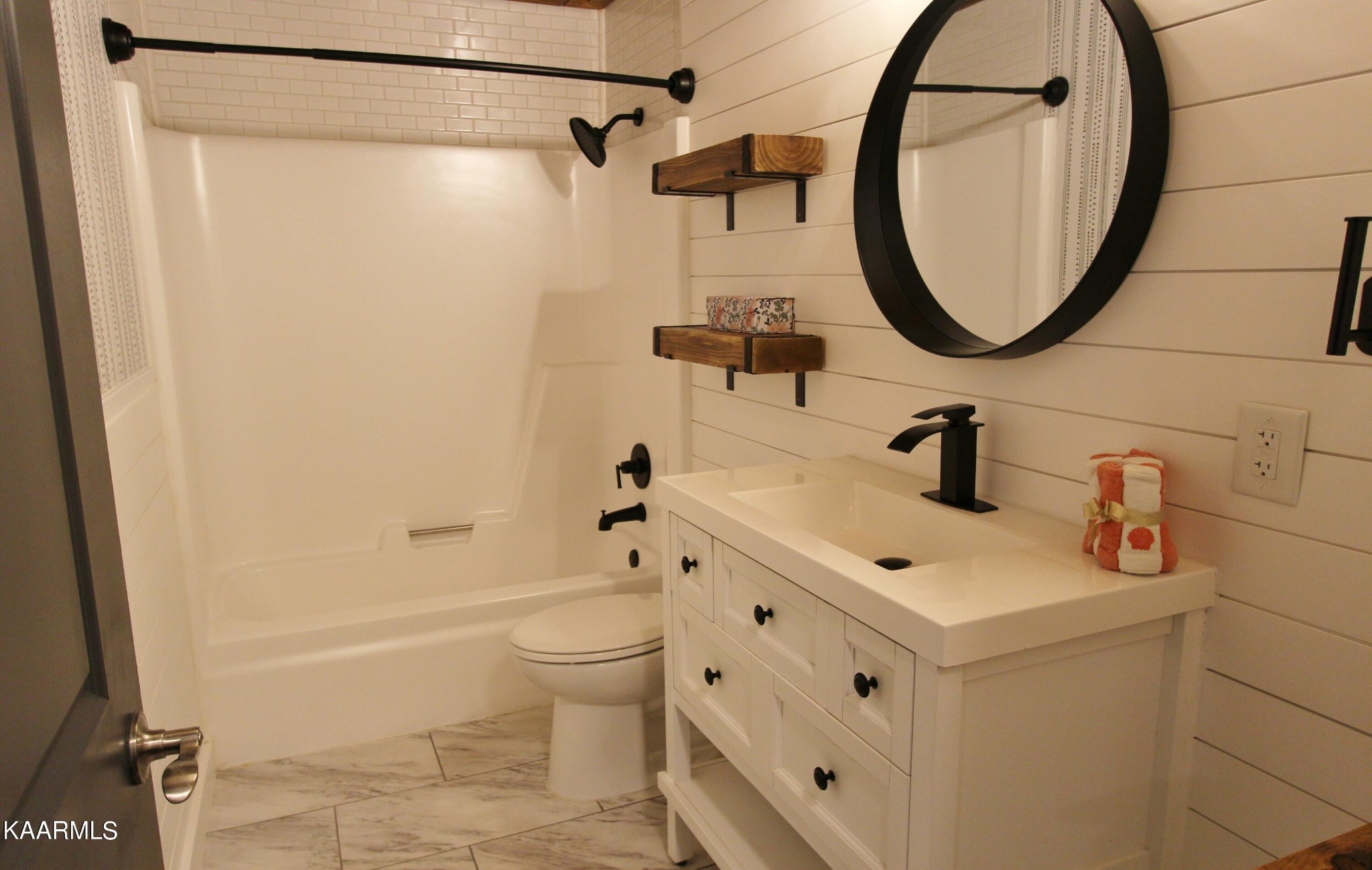 4222 Abercorn Road Knoxville, TN 37921 - Photo 15 of 33 a bathroom with a sink mirror toilet and shower