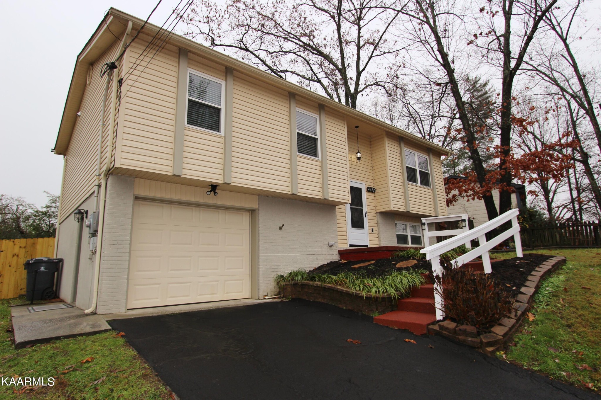 4222 Abercorn Road Knoxville, TN 37921 - Photo 2 of 33 a front view of a house with garden