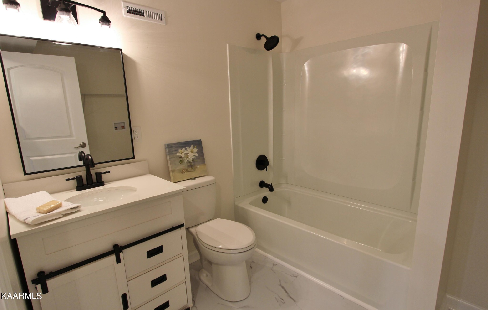 4222 Abercorn Road Knoxville, TN 37921 - Photo 21 of 33 a bathroom with a sink a toilet and shower