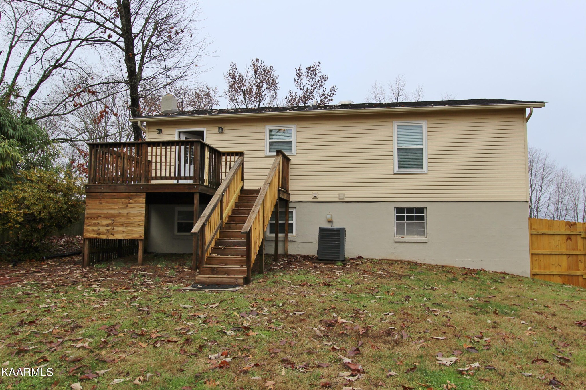 4222 Abercorn Road Knoxville, TN 37921 - Photo 25 of 33 a view of a house with a wooden fence
