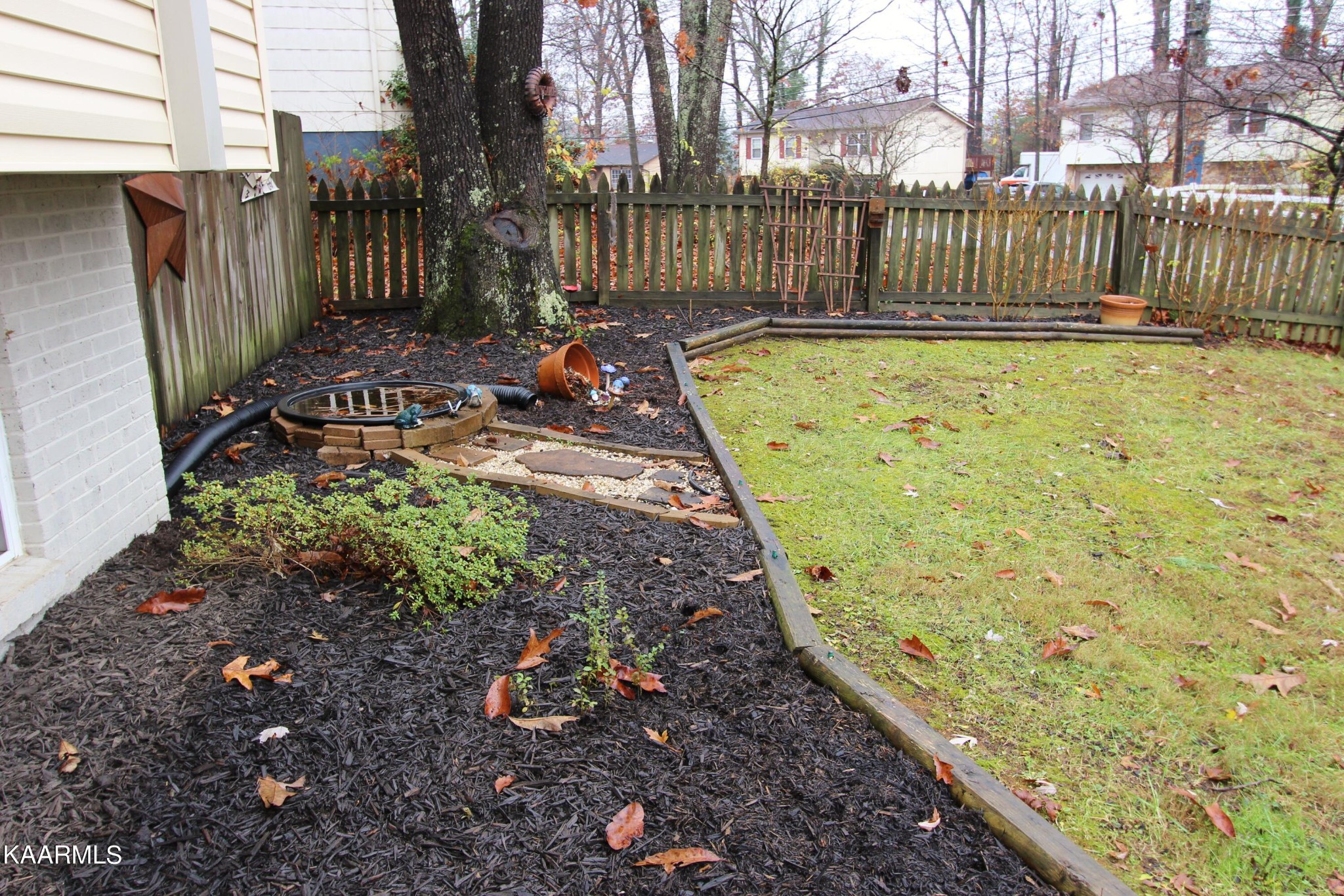 4222 Abercorn Road Knoxville, TN 37921 - Photo 3 of 33 a view of a backyard with iron fence