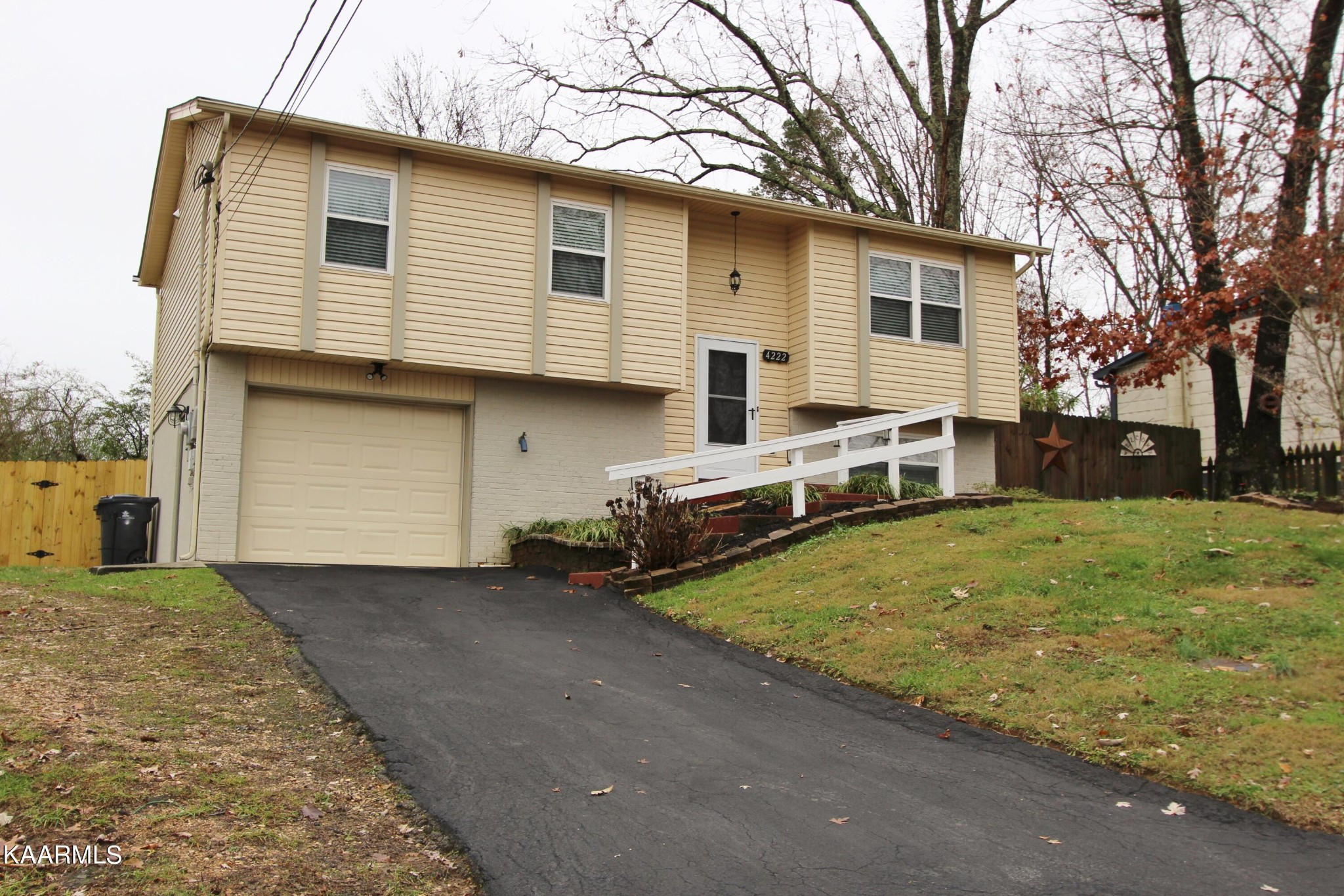 4222 Abercorn Road Knoxville, TN 37921 - Photo 33 of 33 a view of a house with a yard and garage