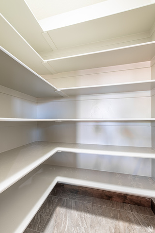322 340 E Street Ivins, UT 84738 - Photo 17 of 61 Spacious pantry with multiple built-in shelves, white finish, and tile flooring