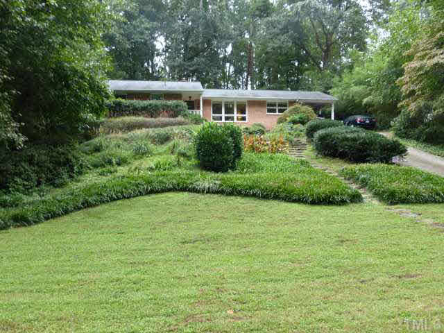 2516 Oxford Road Raleigh, NC 27608 - Photo 20 of 23 The sellers, and Louis Cherry before them, have explored options for relocating a parking area midway along the driveway.