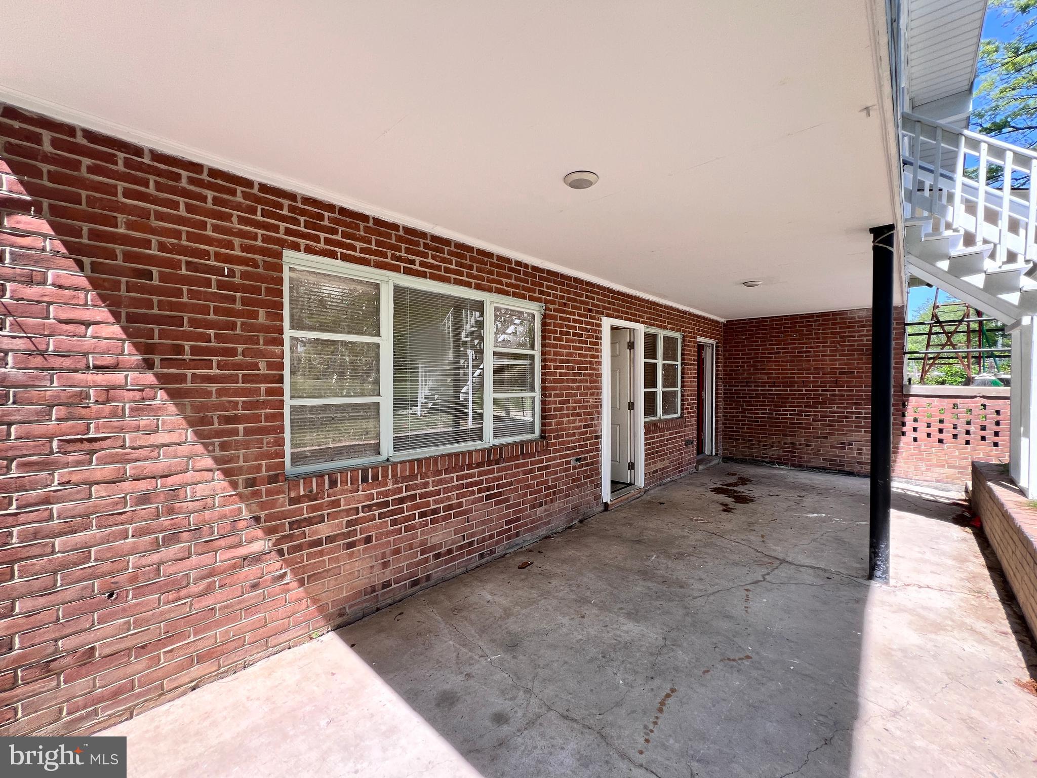 9227 Riggs Road Adelphi, MD 20783 - Photo 58 of 78 a view of house with backyard of the house