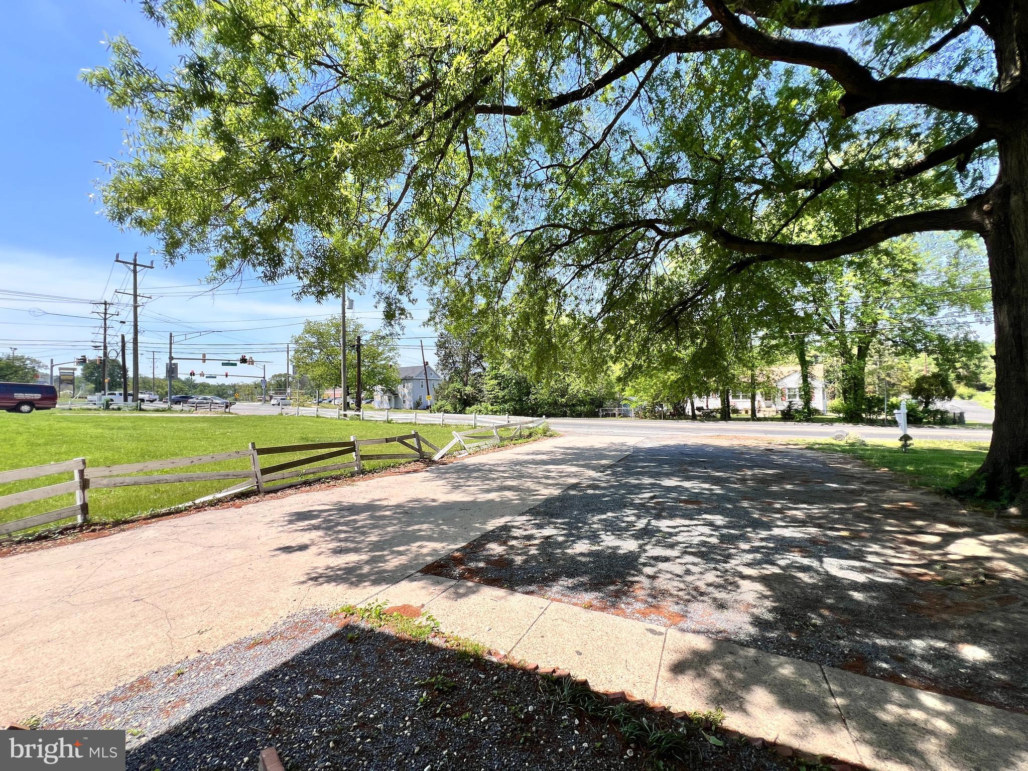 9227 Riggs Road Adelphi, MD 20783 - Photo 6 of 78 a view of a park with large trees