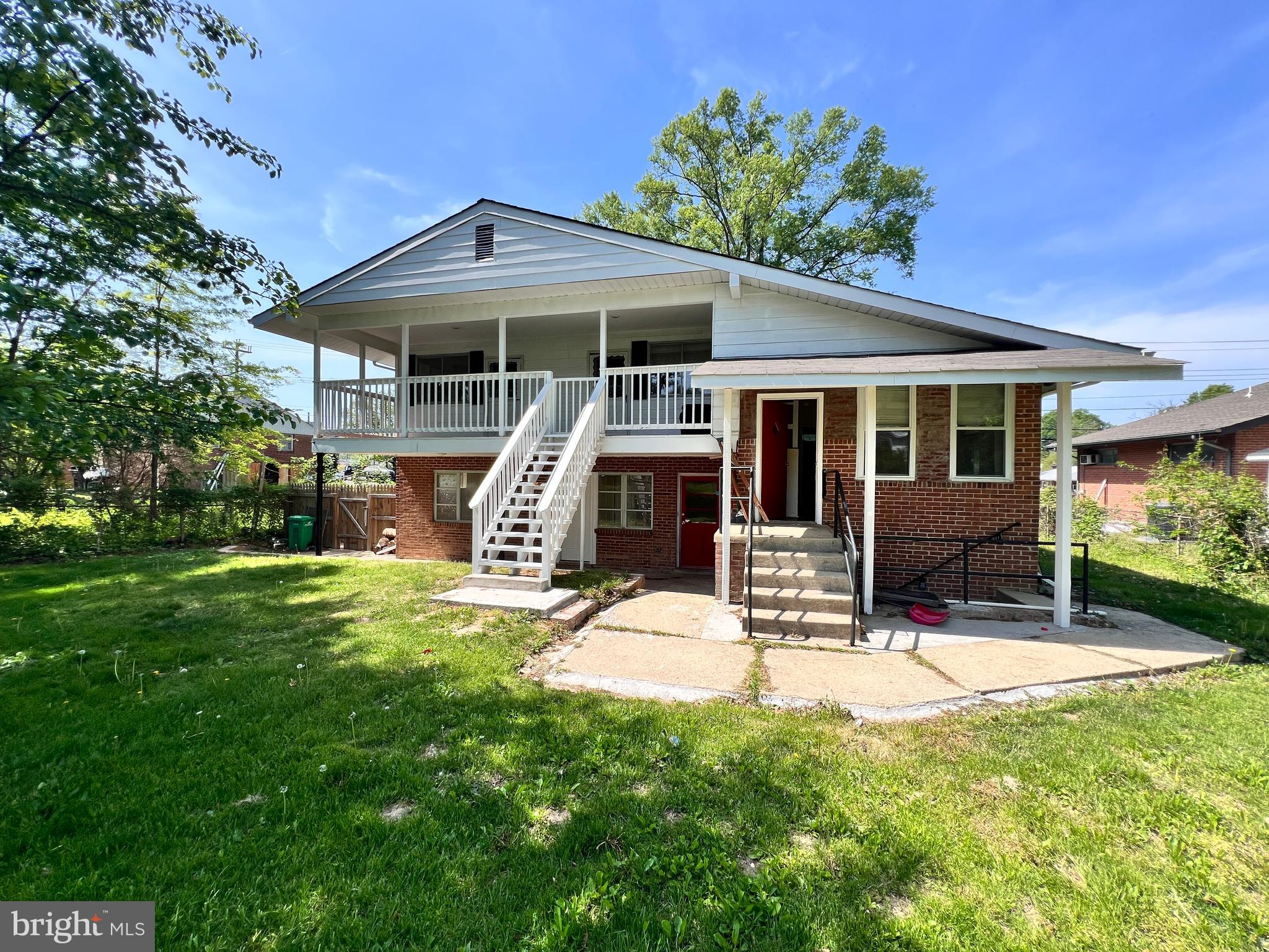 9227 Riggs Road Adelphi, MD 20783 - Photo 66 of 78 front view of a house with a yard