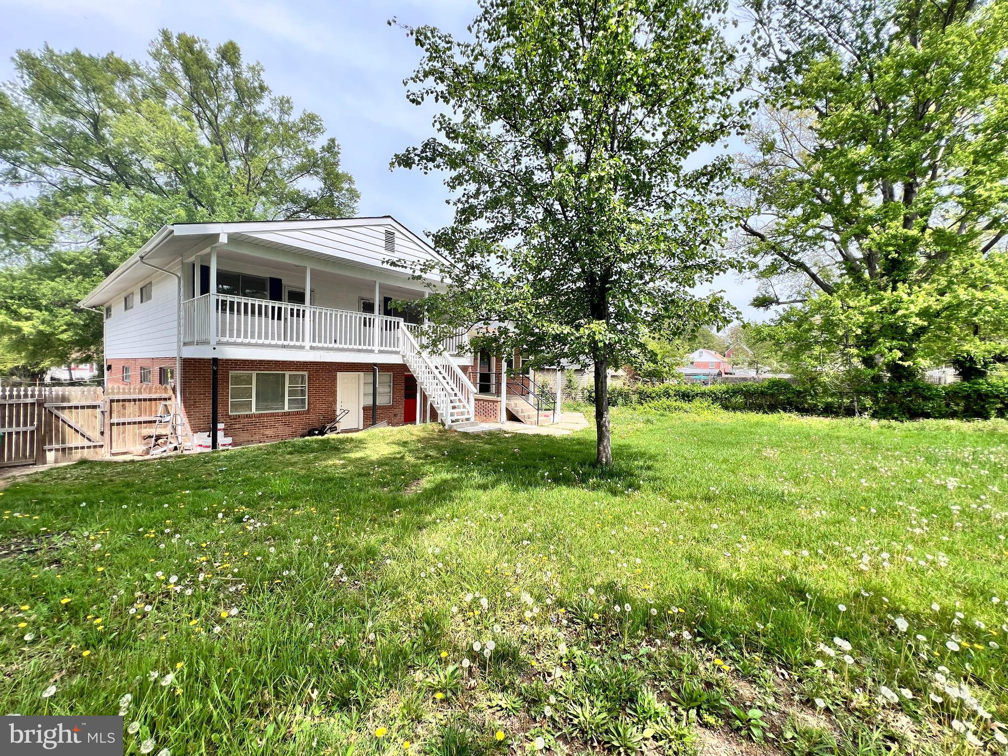 9227 Riggs Road Adelphi, MD 20783 - Photo 67 of 78 a front view of a house with a yard