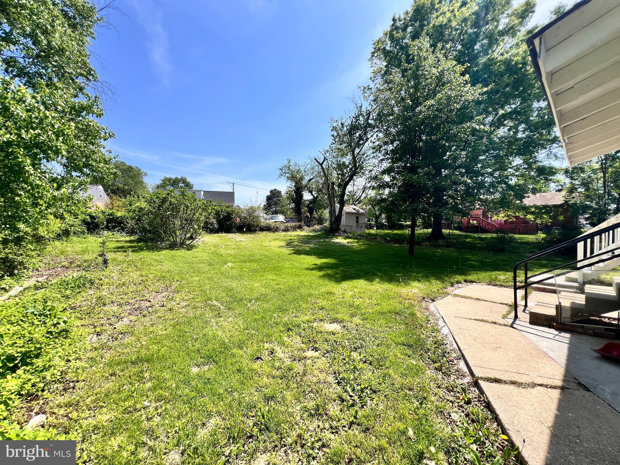 9227 Riggs Road Adelphi, MD 20783 - Photo 72 of 78 a view of yard with swimming pool and green space