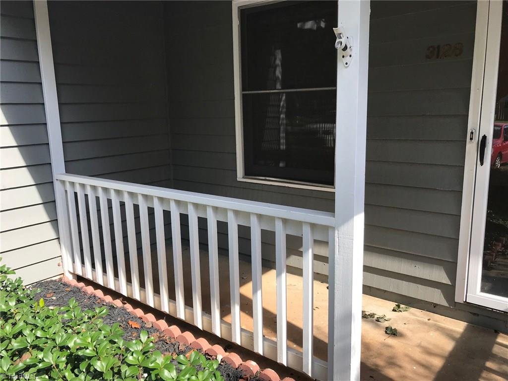 3128 Windchase Court High Point, NC 27265 - Photo 11 of 11 Enjoy your morning coffee on the front covered porch.