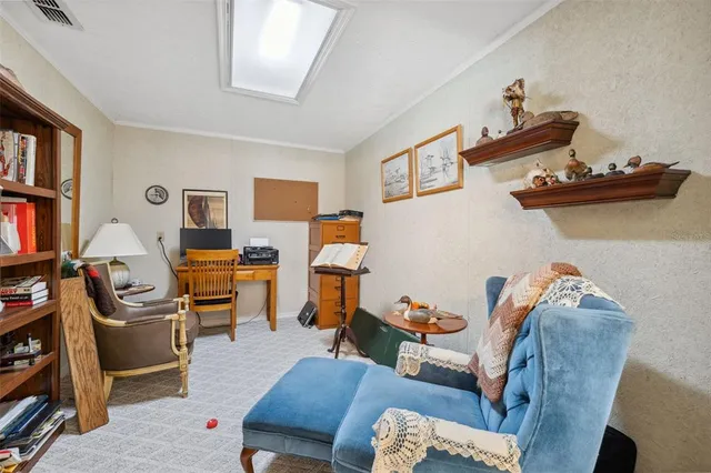 a bed room with a bed and a chandelier