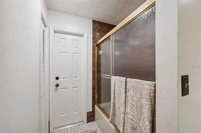 a view of a dining room with furniture wooden floor and chandelier