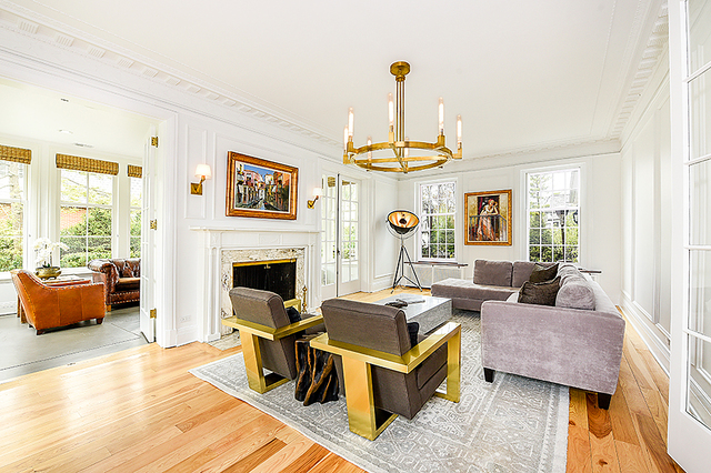596 Arbor Vitae Road Winnetka, IL 60093 - Photo 11 of 62 a living room with furniture and a fireplace