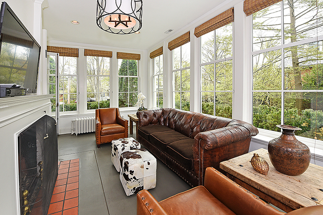 596 Arbor Vitae Road Winnetka, IL 60093 - Photo 17 of 62 a living room with furniture and a floor to ceiling window