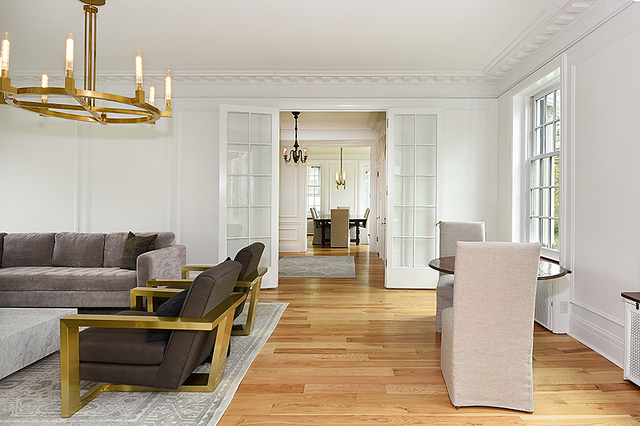 596 Arbor Vitae Road Winnetka, IL 60093 - Photo 18 of 62 a living room with furniture and a table
