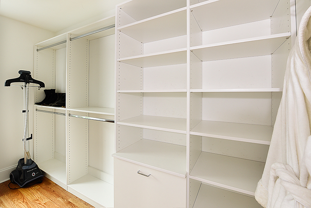 596 Arbor Vitae Road Winnetka, IL 60093 - Photo 38 of 62 a view of a room with rack on the wall