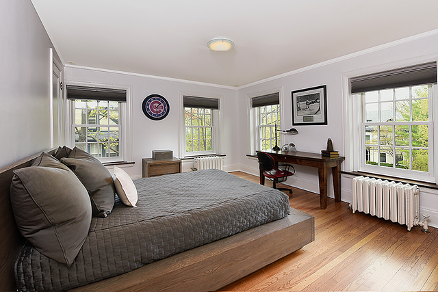 596 Arbor Vitae Road Winnetka, IL 60093 - Photo 39 of 62 a bedroom with a bed and a window