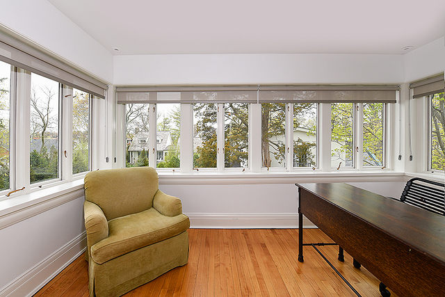 596 Arbor Vitae Road Winnetka, IL 60093 - Photo 41 of 62 a living room with furniture and a large window