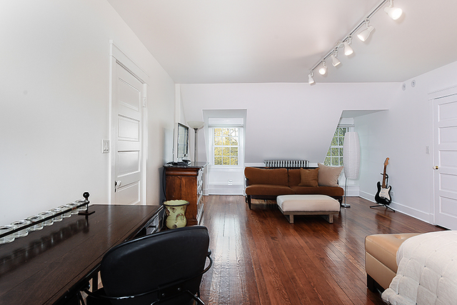 596 Arbor Vitae Road Winnetka, IL 60093 - Photo 44 of 62 a living room with furniture and a wooden floor
