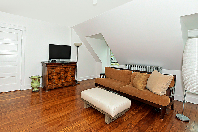 596 Arbor Vitae Road Winnetka, IL 60093 - Photo 45 of 62 a living room with furniture and a flat screen tv