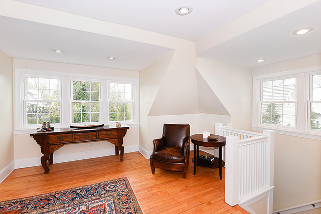 596 Arbor Vitae Road Winnetka, IL 60093 - Photo 55 of 62 a living room with furniture and a large window