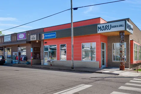 a view of a brick building with a large windows