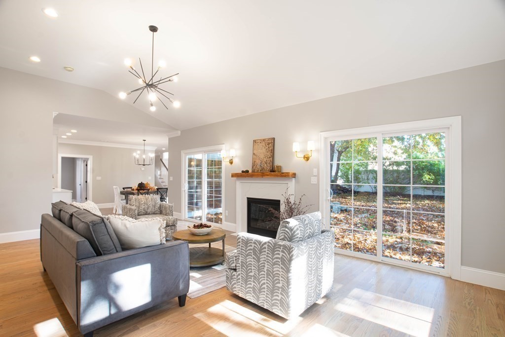 14 Wentworth Road Natick, MA 01760 - Photo 13 of 34 a living room with furniture and a fireplace