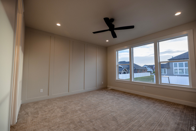 904 South 1900 West Layton, UT 84041 - Photo 12 of 19 Master Bedroom featuring a decorative wall, a ceiling fan, light colored carpet, and recessed lighting