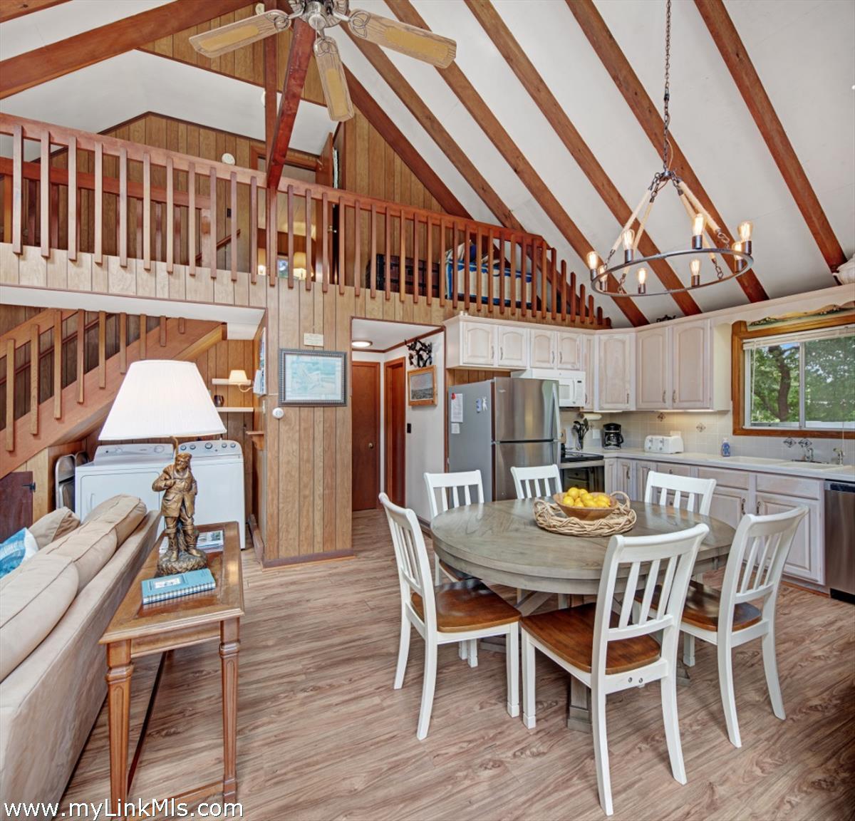 9 Galway Road West Tisbury, MA 02568 - Photo 16 of 26 a view of a dining room with furniture window and wooden floor