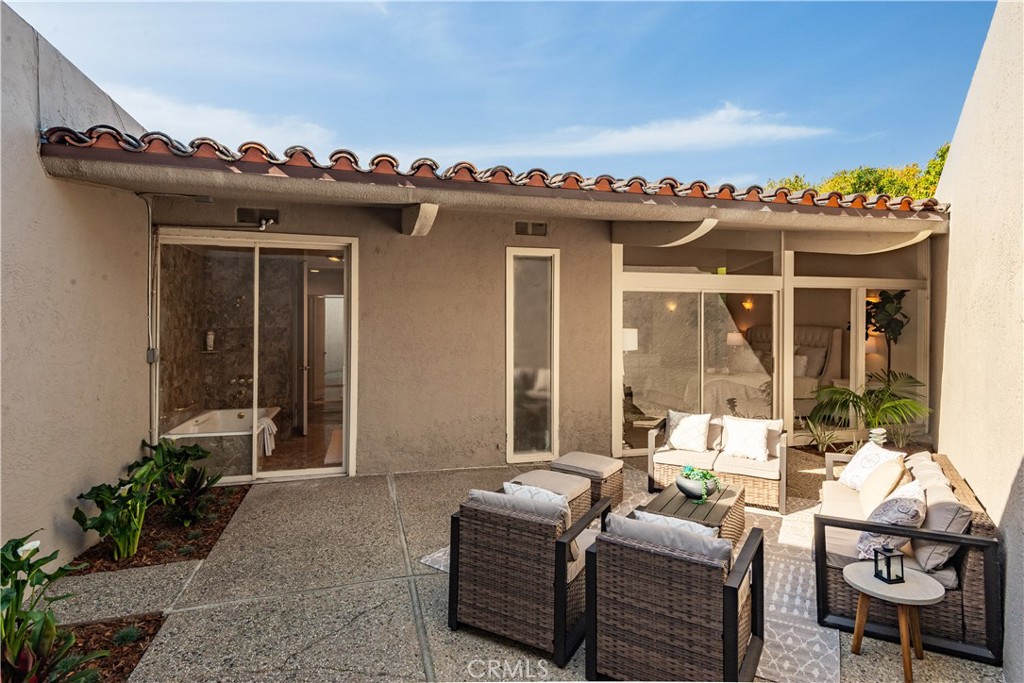 30175 Ave Tranquila Rancho Palos Verdes, CA 90275 - Photo 16 of 35 a outdoor living space with furniture and a potted plant