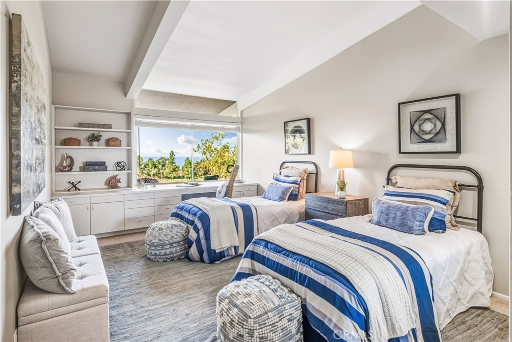 30175 Ave Tranquila Rancho Palos Verdes, CA 90275 - Photo 19 of 35 a bedroom with two beds and a large window