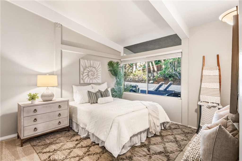 30175 Ave Tranquila Rancho Palos Verdes, CA 90275 - Photo 21 of 35 a bedroom with a large bed and a window