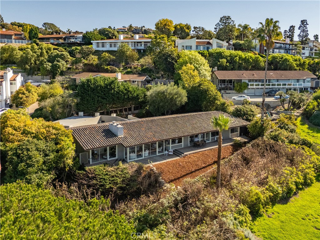 30175 Ave Tranquila Rancho Palos Verdes, CA 90275 - Photo 32 of 35 an aerial view of a house with a big yard and large trees