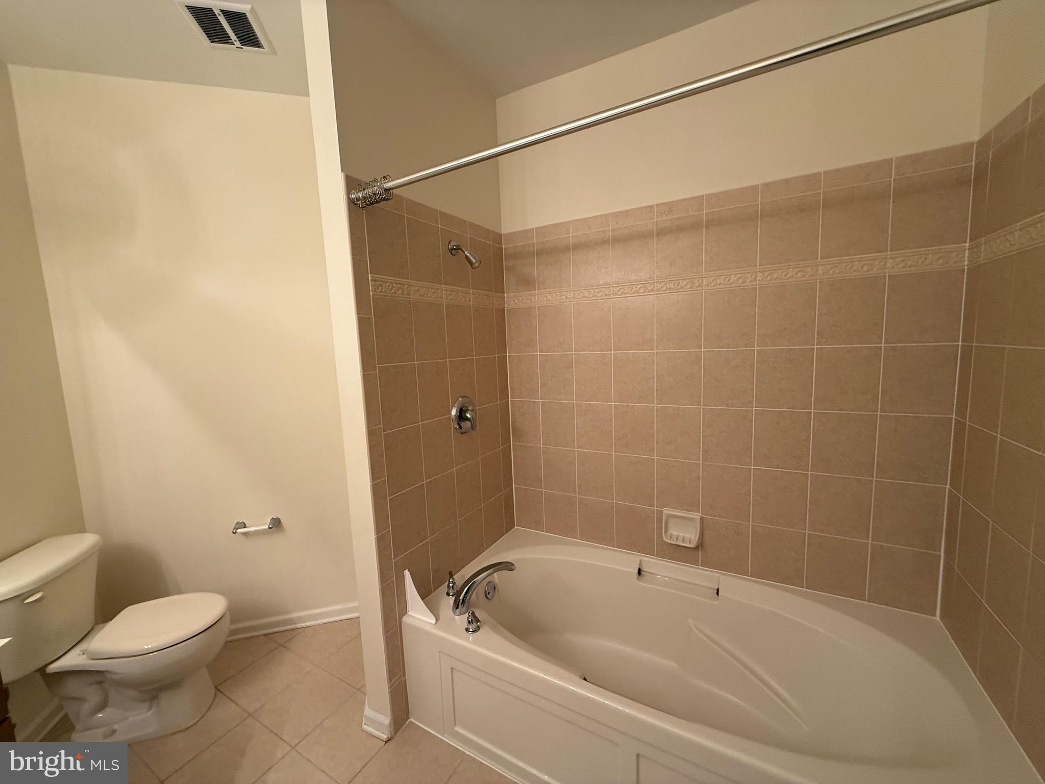 231 Masterson Court Ewing, NJ 08618 - Photo 21 of 43 a bathroom with a toilet and shower