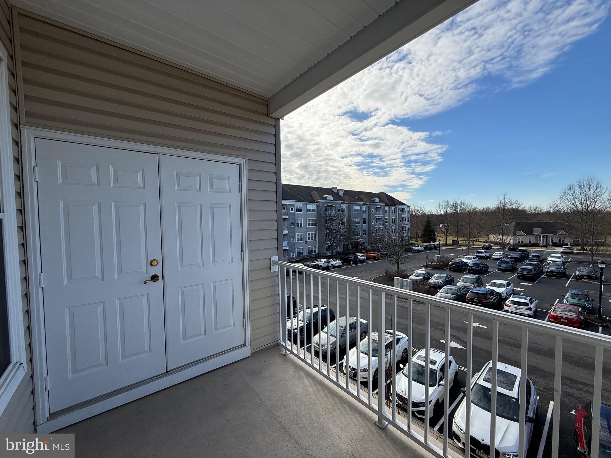 231 Masterson Court Ewing, NJ 08618 - Photo 34 of 43 a view of a balcony with furniture